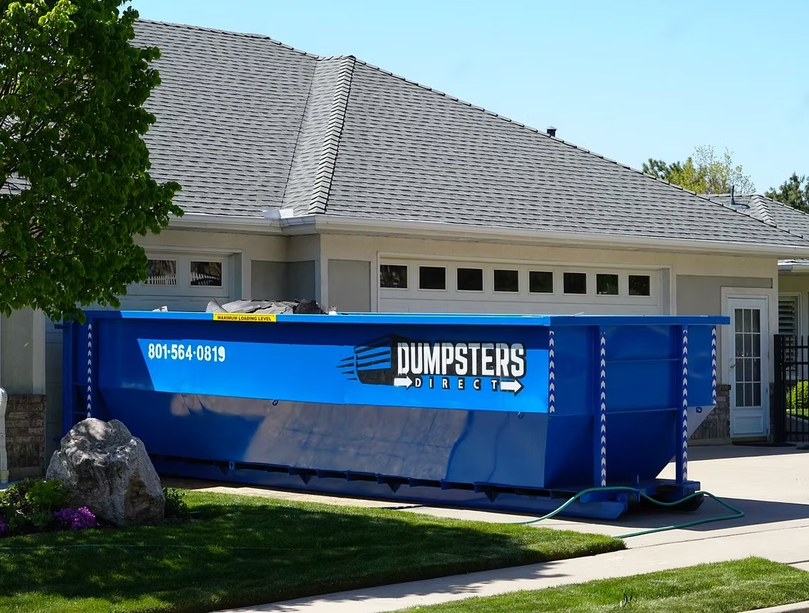 30 yard Dumpsters Direct roll off dumpster on a driveway
