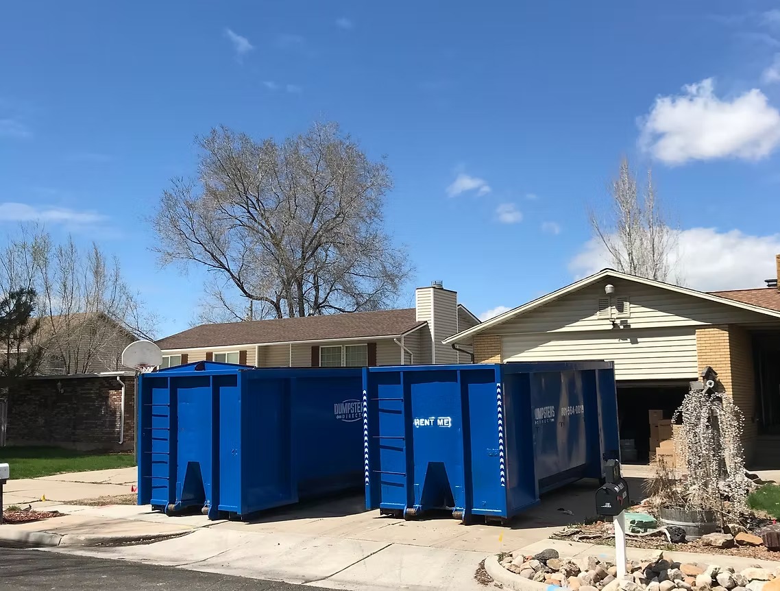 Two 40 yard Dumpsters Direct roll off dumpsters on a driveway